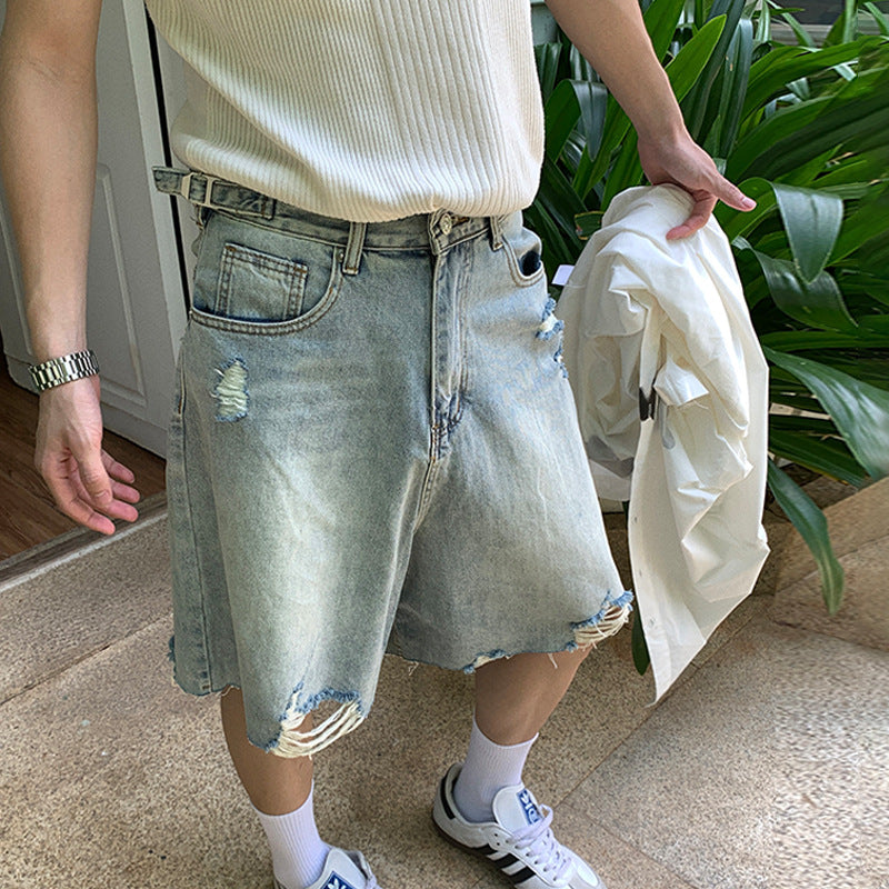Washed distressed denim shorts