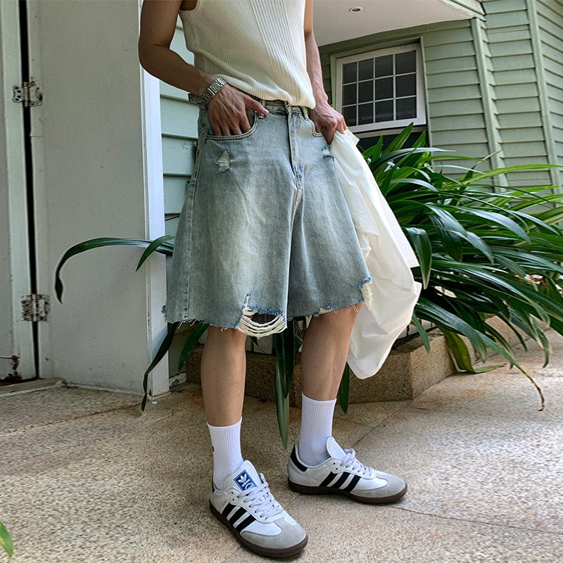 Washed distressed denim shorts