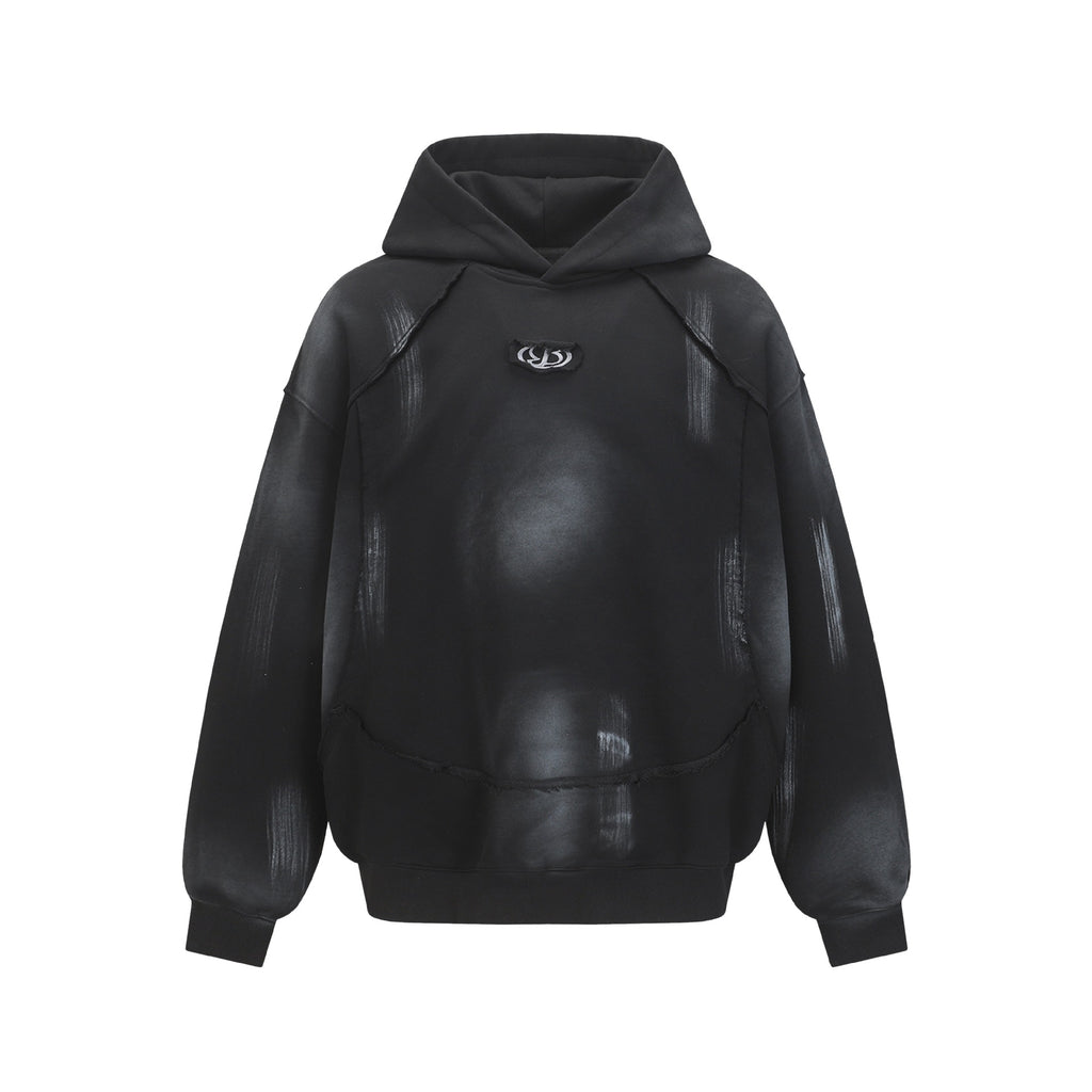Hairy edge washed and spray dyed hoodie