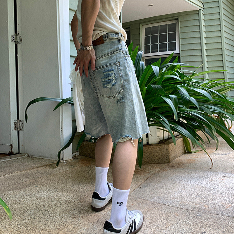 Washed distressed denim shorts