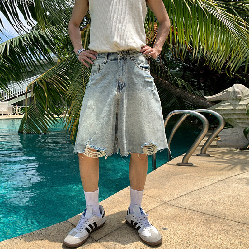 Washed distressed denim shorts